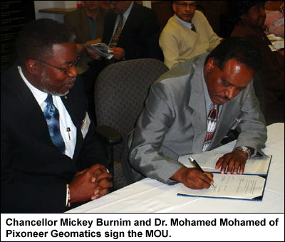 Chancellor Mickey Burnim and Dr. Mohamed Mohamed of Pixoneer Geomatics